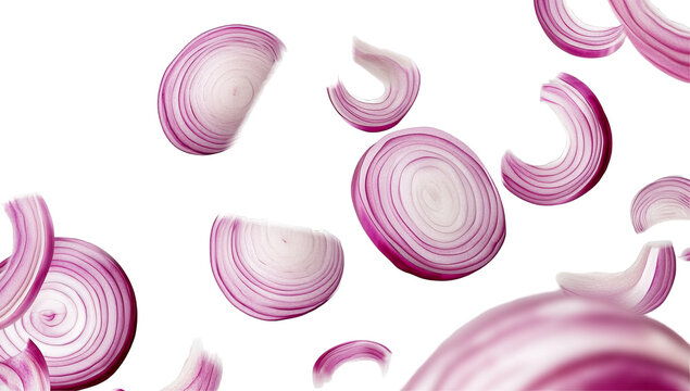 Sliced red onions in mid-air