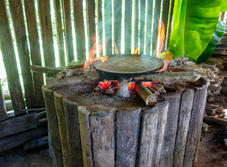 Cooking Cassava Cake in Siona Village, Cuyabeno, amazonia, Ecuador