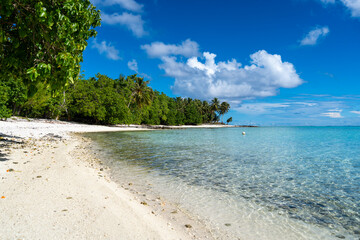 White sand beach of Motu Pitiahe with turquoise lagoon, Maupiti, French Polynesia