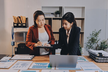 Business meeting time. Business man and business woman working on startup project.