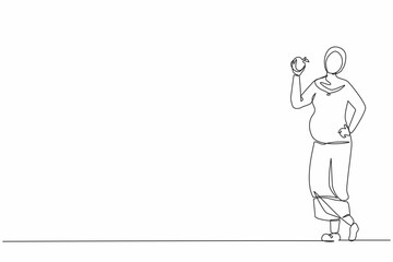 Single continuous line drawing happy beautiful Arabian pregnant woman holding apple. Pregnancy and motherhood concept eating healthy fresh fruit food. One line draw graphic design vector illustration