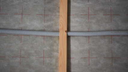 Construction of interior wall with electrical conduit and framework visible