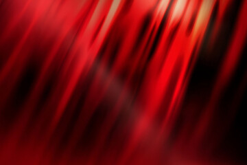 abstract red background with a gradient effect. The design includes flowing, blurred streaks of red in varying shades, ranging from deep crimson to bright scarlet