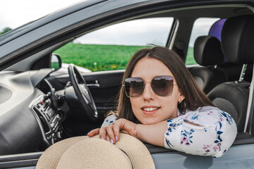 Car trip family. Parents child vehicle. Journey countryside freedom sunlight.