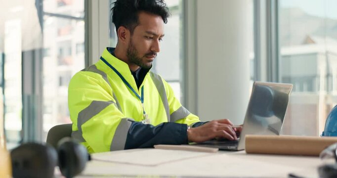 Man, laptop and contractor with typing for planning, architecture and tech for building blueprint notes. Construction, renovation or maintenance with online design writing or strategy for engineer