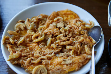 Crispy pork rind Omelet in plate