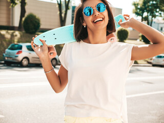 Young beautiful sexy smiling hipster woman in sunglasses.Trendy female in summer T-shirt and...