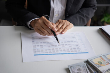 Accountant work in the office, calculate taxes and cash