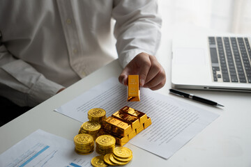 Businessmen discuss investing in gold bars and stocks