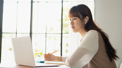 Asian student woman online learning from home