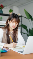 Asian student woman online learning from home