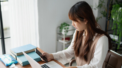 Asian student woman online learning from home
