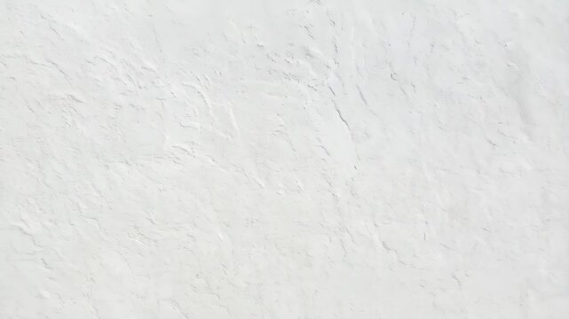Monochrome abstract white plaster wall background with rough texture and detailed stucco pattern for architectural design and surfaces