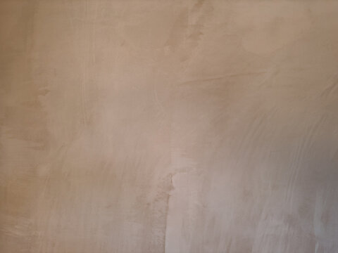 Chic Beige Plaster Wall with Abstract Textures: Perfect for Modern Interior Design