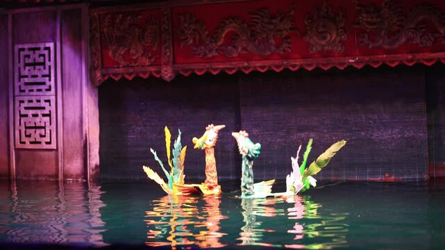 Traditional Vietnamese water puppet dolls theatre show in Hanoi, Vietnam, water puppetry doll show, in Thang Long theatre , one of the most traditional water puppet show in Hanoi, Vietnam.