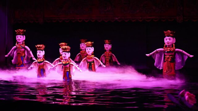 Traditional Vietnamese water puppet dolls theatre show in Hanoi, Vietnam, water puppetry doll show, in Thang Long theatre , one of the most traditional water puppet show in Hanoi, Vietnam.