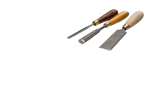 Displaying three vintage chisels with wooden handles against a transparent background, highlighting traditional woodworking tools and craftsmanship