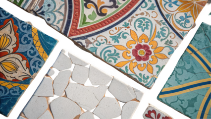 Different colorful mediterranean ceramic tiles with floral and geometric patterns. Including some broken pieces. Are displayed on a transparent background. Ready to be used in various design projects