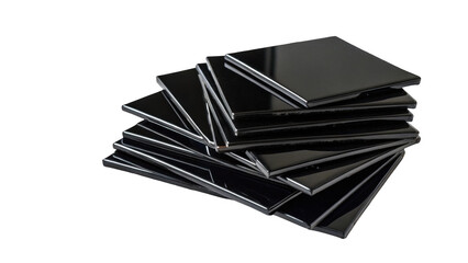 Glossy black ceramic tiles neatly stacked, showcasing a modern and sleek design. Perfect for interior design projects, these tiles offer a sophisticated and stylish finish