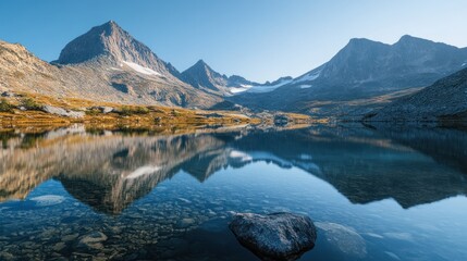 Fototapeta premium Serene Mountain Lake Reflection in Autumn