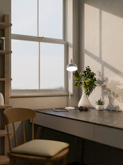 Book and acorn with pot plant on black marble table at working or study corner near window in a room