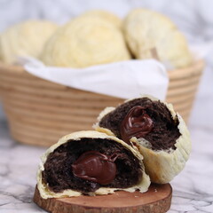 Chocolate pia bread with melted chocolate filling. in the photo with a white background