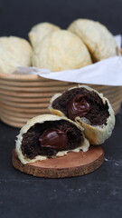 Chocolate pia bread with melted chocolate filling. in the photo with a white background