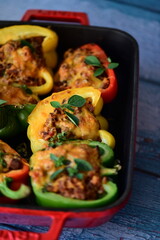 Stuffed Peppers with Meat, Rice, and Vegetables in a Baking Dish