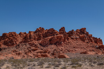 Fototapeta premium Aztec Sandstone, Early Jurassic geological formation of primarily eolian sand . Beehive rock formations,Valley of Fire State Park, Clark County, Nevada geology. Weathering. Desert varnish