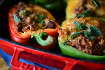 Stuffed Peppers with Meat, Rice, and Vegetables in a Baking Dish