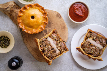 English pie with three types of meat, nuts, spices and French mustard.