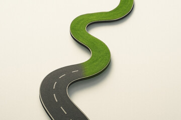 A winding asphalt road seamlessly transforms into a lush green grass path - Generative AI