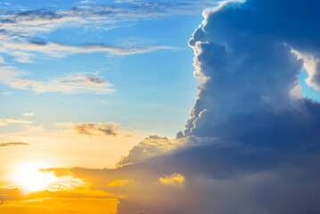 dramatic sunset among dense clouds