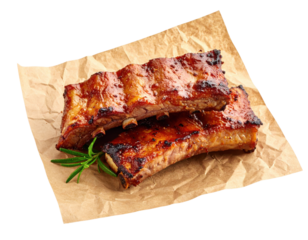 Juicy grilled pork ribs glazed with sauce, garnished with a sprig of rosemary, served on parchment paper.