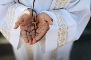 cross in the hands
