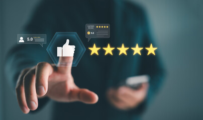 Customer satisfaction and 5-star review concept with businessman pressing thumbs-up icon and rating...