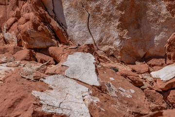 Fire Wave Trail, red Aztec Sandstone outcrops, Early Jurassic geological formation of primarily eolian sand. Valley of Fire State Park, Clark County, Nevada geology. Weathering. Caliche / Calcrete. 