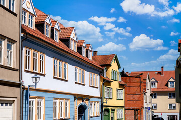 Colorful historic townhouses including the Frankenbergsches Palais on a sunny residential street in Gotha, Thuringia, Germany