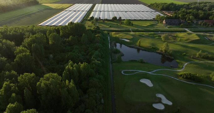 large field of soalr panels, energy from the sun, energy transistion, sun electricity. Aerial view. Biddinghuizen, Flevoland, The Netherlands. Aerial video.