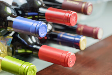 Closeup view of wine bottle necks