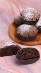 Chocolate Smurf Bread sprinkled with powdered sugar and chocolate paste inside