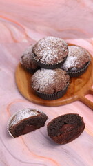 Chocolate Smurf Bread sprinkled with powdered sugar and chocolate paste inside
