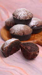 Chocolate Smurf Bread sprinkled with powdered sugar and chocolate paste inside