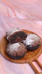 Chocolate Smurf Bread sprinkled with powdered sugar and chocolate paste inside