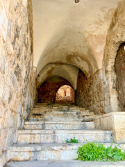 Traditional under passage at narrow street of Mardin in Turkey