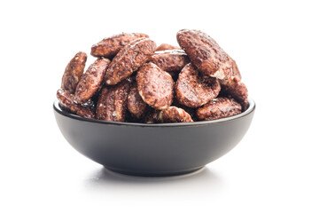 Nuts coated in sugar and honey in bowl isolated on white background.