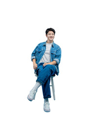 Full body image of young asian man sitting on chair and posing on PNG background