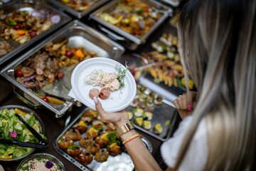 Food tasting event featuring a variety of dishes and colorful presentations on display at a local venue