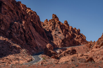 red Aztec Sandstone outcrops, Early Jurassic geological formation of primarily eolian sand. Mouse's Tank Road,Valley of Fire State Park, Clark County, Nevada geology. Weathering. Desert varnish	