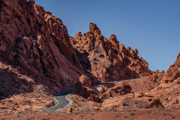 red Aztec Sandstone outcrops, Early Jurassic geological formation of primarily eolian sand. Mouse's Tank Road,Valley of Fire State Park, Clark County, Nevada geology. Weathering. Desert varnish	